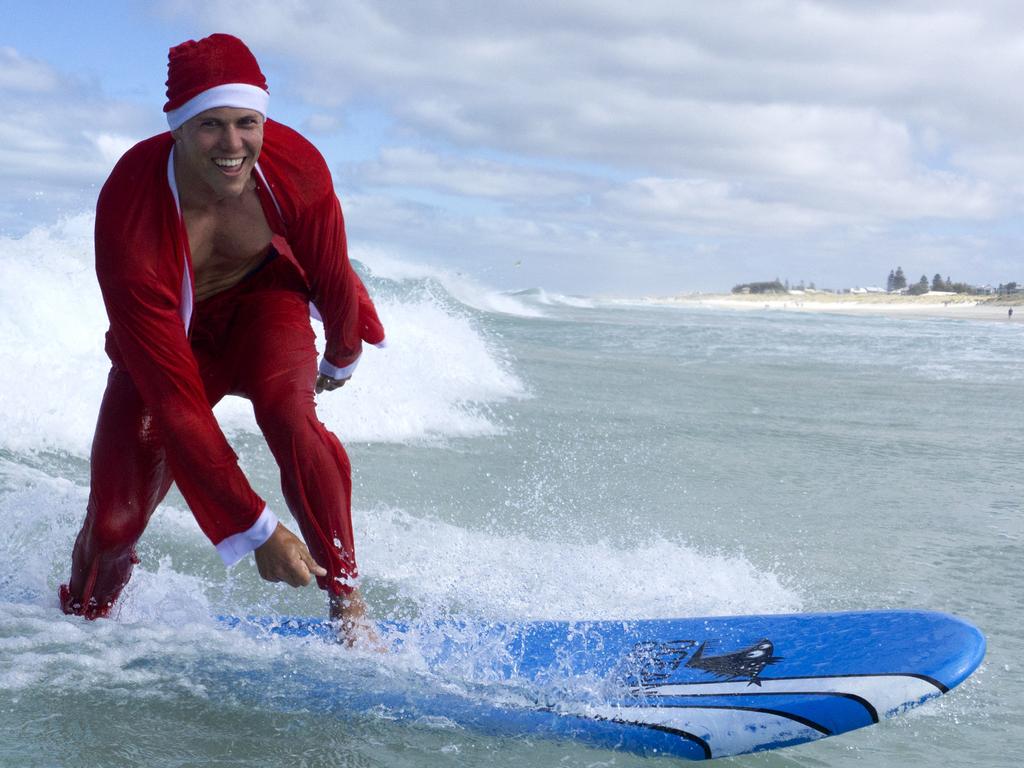 Surfing Santas Hit Waves At Scarborough Beach | News.com.au — Australia ...