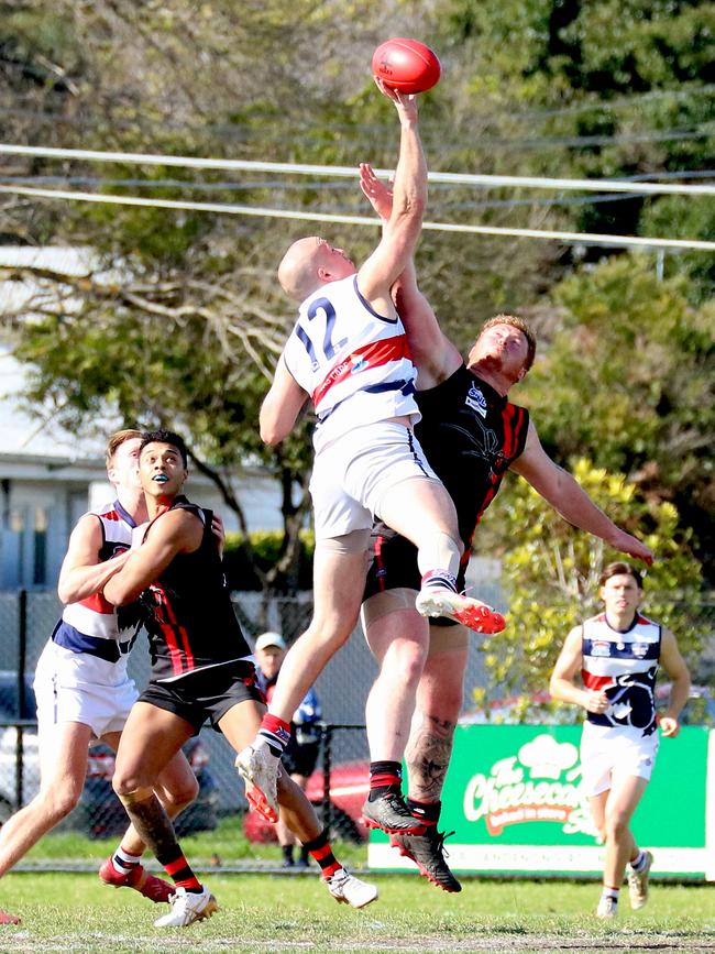 Joel Jones gets a tap away. Pictures: Cam Mitchell