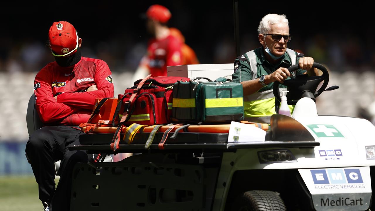 Nic Maddinson was dejected after being helped from Marvel Stadium. Picture; Darrian Traynor/Getty Images