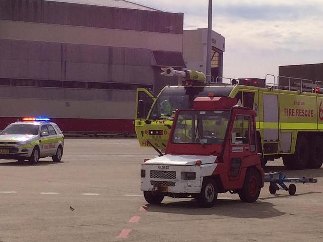 Passengers were  not allowed to leave the aircraft until fire crews had made an exterior inspection. Picture: Charles Miranda