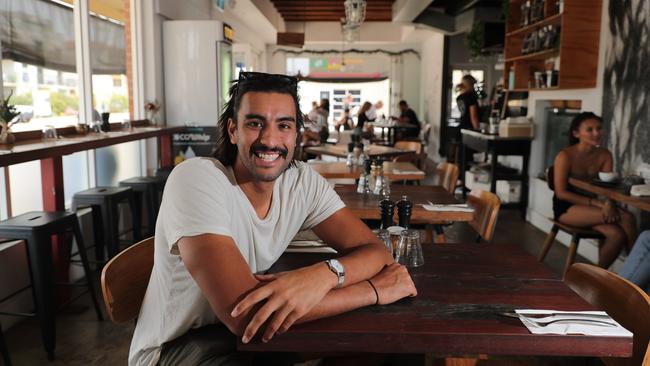 Former Gold Coast Suns AFL player Tom Nicholls, who has recently retired, relaxing at BSKT Cafe at Nobby Beach. Picture Glenn Hampson