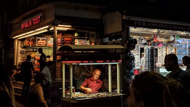 A man sells roasted chestnuts in Istanbul, Turkey. Picture: Getty