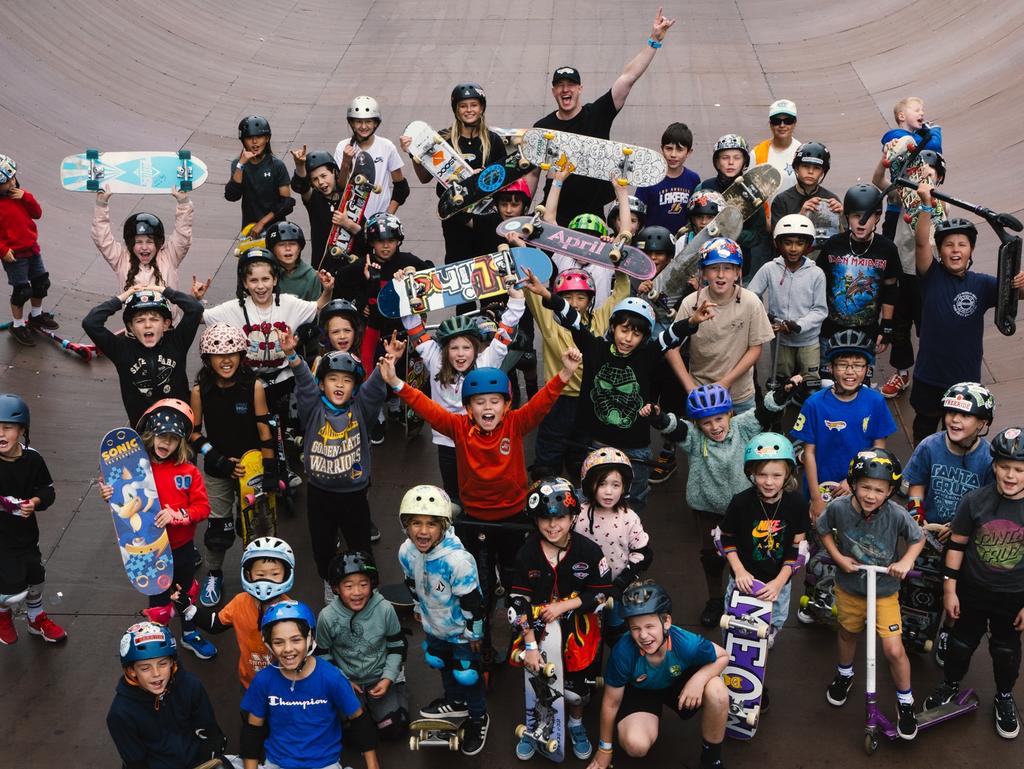 Ruby Trew and Jarryd Hughes put young skateboarders through their paces at the Monster Skatepark at Sydney Olympic Park. Picture: Ikko Ehode Arimoto