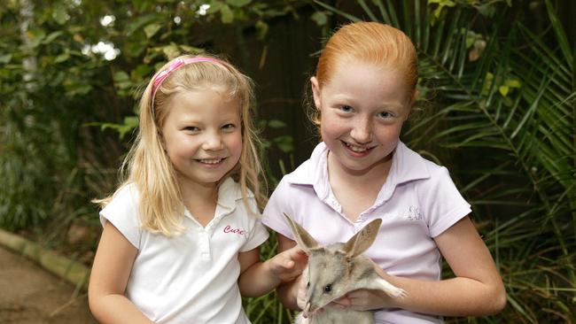 Harley Gordon, 5, and Bronte Gordon, 10, with a bilby.