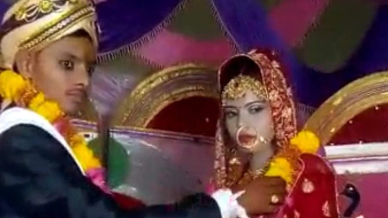 Groom Manjesh Kumar is pictured with his bride, Surbhi, on their wedding day – before she died from a suspected heart attack. Picture: Supplied