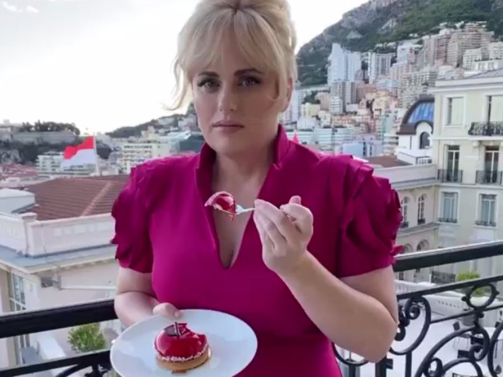 Rebel Wilson eating cake in Monaco.