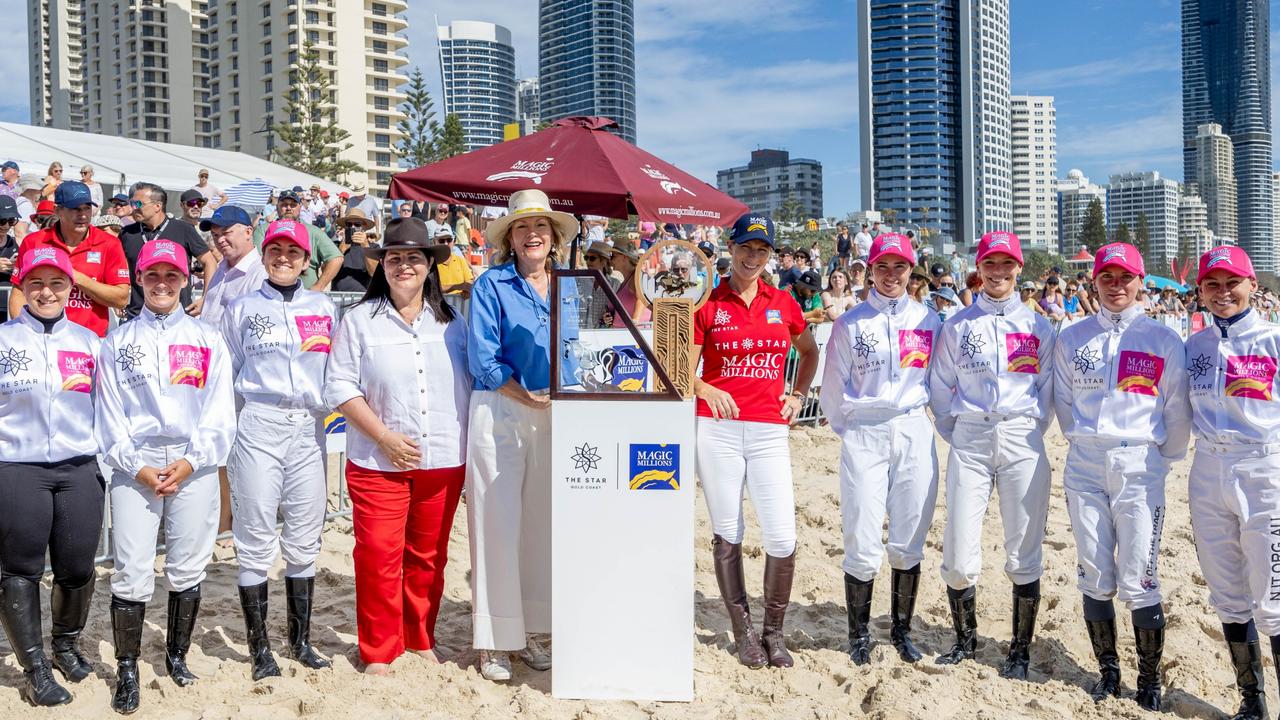 Magic Millions co-owner Katie Page and Racing Minister Grace Grace with female jockeys on the Gold Coast. Picture: Luke Marsden