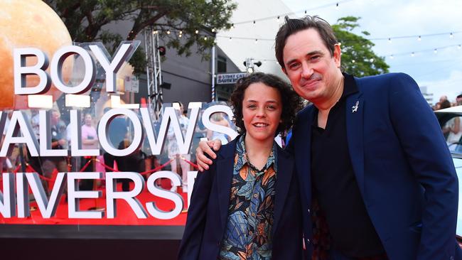 Felix Cameron and Trent Dalton pose for photographs during the Netflix global premiere of "Boy Swallows Universe".