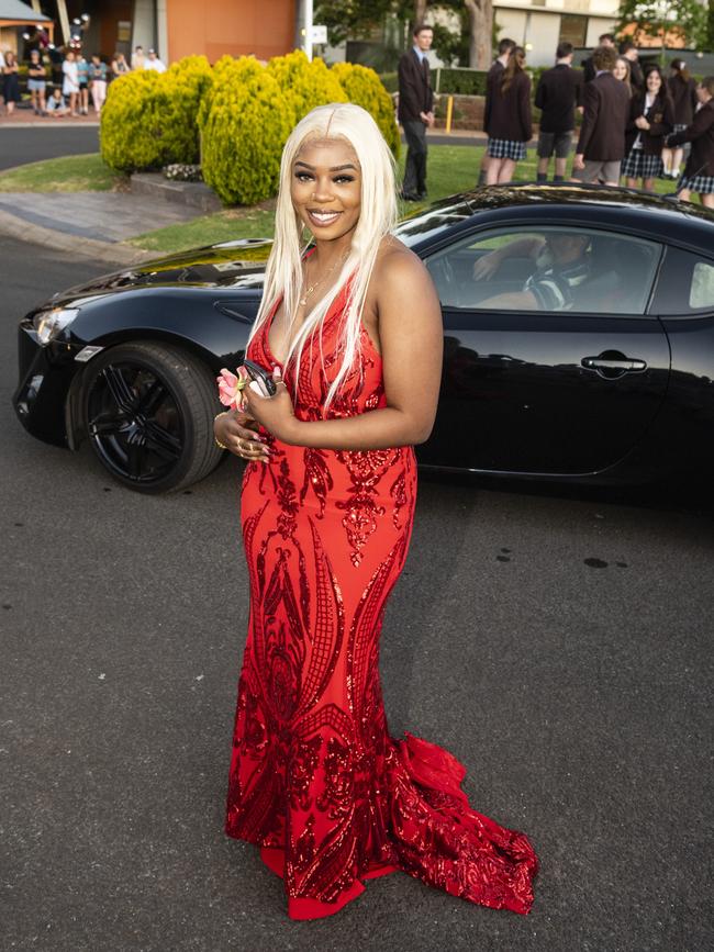 Jesica Mudekereza arrives at Harristown State High School formal at Highfields Cultural Centre, Friday, November 18, 2022. Picture: Kevin Farmer