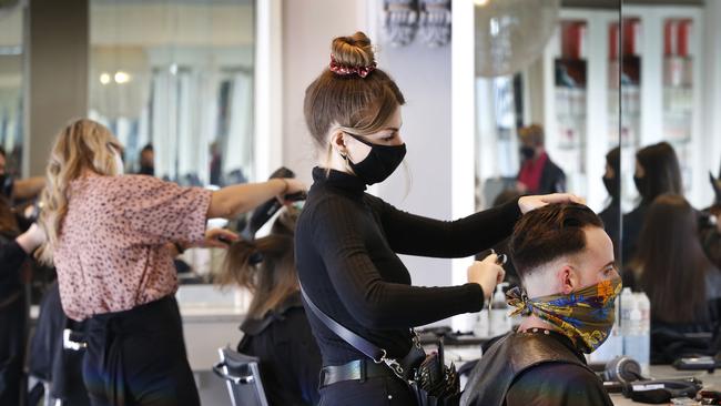 Hairdresser John Scandizzo of South Yarra hair salon Joey Scandizzo says business is booming after lockdown. Picture: David Caird