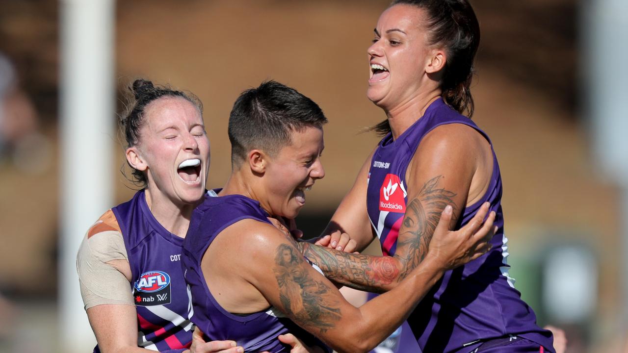 Evie Gooch celebrates a goal for the Dockers.