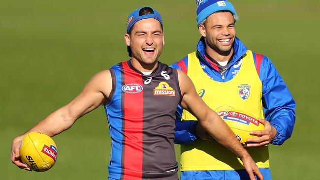 Luke Dahlhaus and Jason Johannisen share a laugh at training.