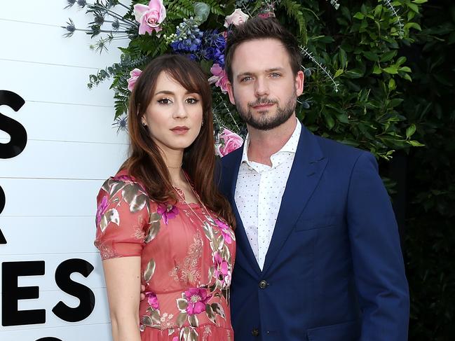 Adams with his actress wife Troian Bellisario. Picture: Phillip Faraone/Getty Images
