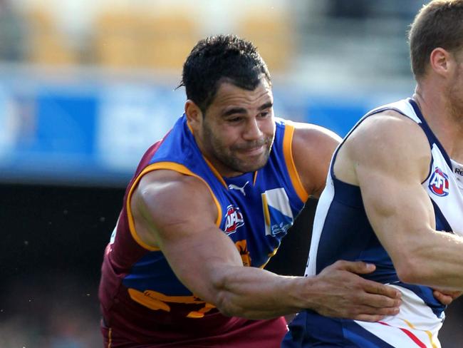 Albert Proud in his AFL playing days for the Brisbane Lions.