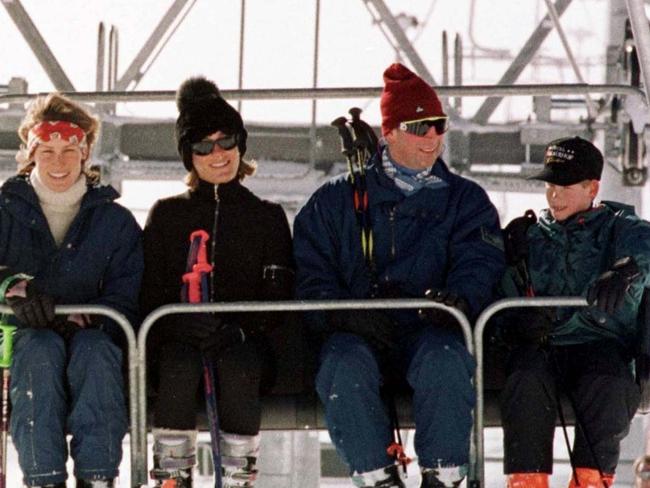 Britain's Prince Charles, 2nd right, with his younger son Prince Harry, right, joined in a ski lift by Santa Sebag Montefiore, with her sister, and Prince Charles' goddaughter, Tara Palmer-Tomkinson, on the way up the Gotschnabahn ski runs above Klosters, Switzerland. Picture:  AP