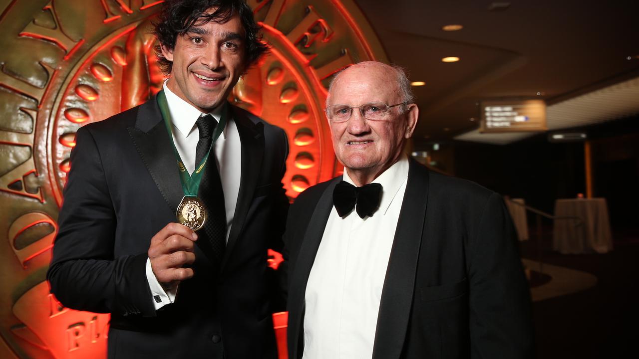 Johnathan Thurston and Arthur Summons after Johnathan Thurston wins the Provan Summons Medal at the 2014 Dally M Awards.