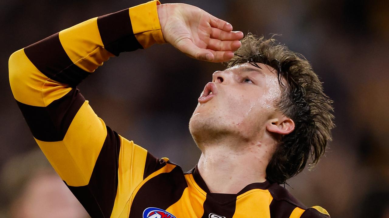 Jack Ginnivan mimes drinking a can of beer after kicking a final-quarter goal in Hawthorn’s elimination final win over Western Bulldogs. Picture: Dylan Burns / Getty Images