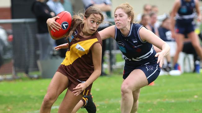 Catia Cococcia of Kew contests with Brigitte Wolhuter of Caulfield at Glen Huntly Oval on Saturday. Picture: Hamish Blair