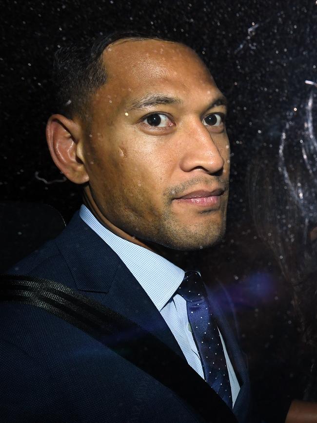 Folau leaves a Code of Conduct hearing in Sydney. (AAP Image/Joel Carrett)