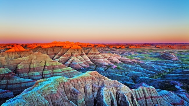 <h2>6. Badlands National Park, South Dakota</h2><p><strong>When:</strong> Summer gets thunderstorms, so visit in spring and autumn.</p><p><strong>Why:</strong> Scientists have uncovered 19,000 fossils at a site called the Big Pig Dig, one of Badlands’ most popular attractions. Those fossils belong to ancient giant pigs (Archaeotherium), hence the site’s name, hornless rhinos (Subhyracodon) and small horses (Mesohippus). Other fascinating finds have been fossils of the mosasaur, a marine lizard that was an apex predator. You can learn more about these ancient creatures and meet a palaeontologist at the Fossil Preparation Lab (open June to September). If you’re travelling with young kids, head out on the Fossil Exhibit Trail, a short wander along a boardwalk with fossil replicas and exhibits.</p><p><a href="https://travelsouthdakota.com/" target="_blank" rel="noopener">travelsouthdakota.com</a></p>