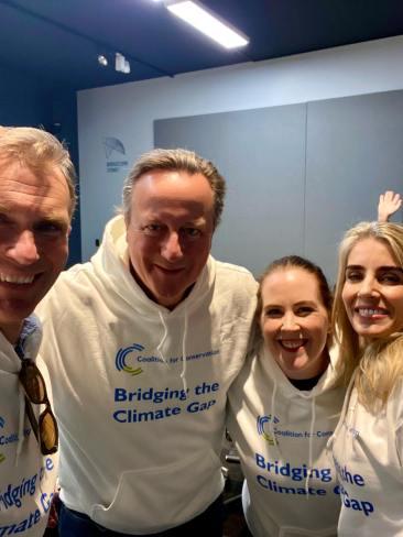 NSW Infrastructure Minister Rob Stokes, former British PM David Cameron, North Shore MP Felicity Wilson and C4C Chairperson Cristina Talacko wearing C4C jumpers at an event. Source: C4C's Facebook 