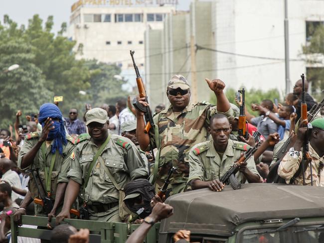 A file photos shows soldiers parading in vehicles near Bamako. Picture: Getty Images.