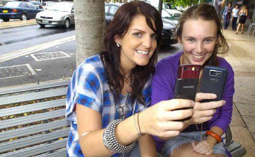 Maddie Orchard from East Ballina, and Katie Cross from East Lismore, admit to using their mobile phones while driving even though they know it’s dangerous. . Picture: Cathy Adams