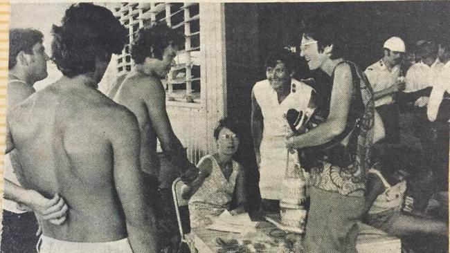 Wilga Morris (wearing white) and a local Salvation Army volunteer (seated) during the initial response to Cyclone Tracy. Picture: Supplied