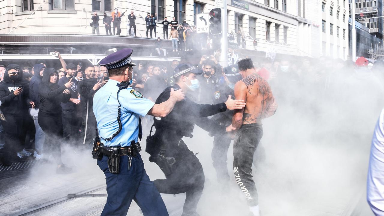 Protesters are arrested by the police during the anti-lockdown rally in Sydney on Saturday. Picture: NCA NewsWire/Flavio Brancaleone