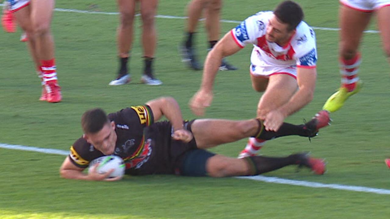 Nathan Cleary crashes over the try line.