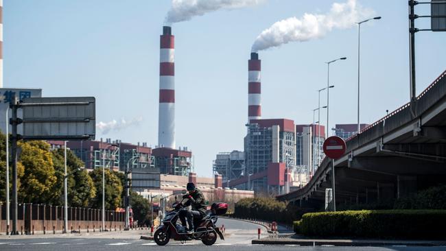 A 2017 picture of the Shanghai Waigaoqiao Power Generator Company coal power plant in China. (Photo by JOHANNES EISELE / AFP)