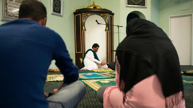 Muhsin Hendricks leads the start of the Jumu'ah prayer at the Inner Circle Mosque, in Capetown, 2016. Picture: Rodger Bosch/AFP