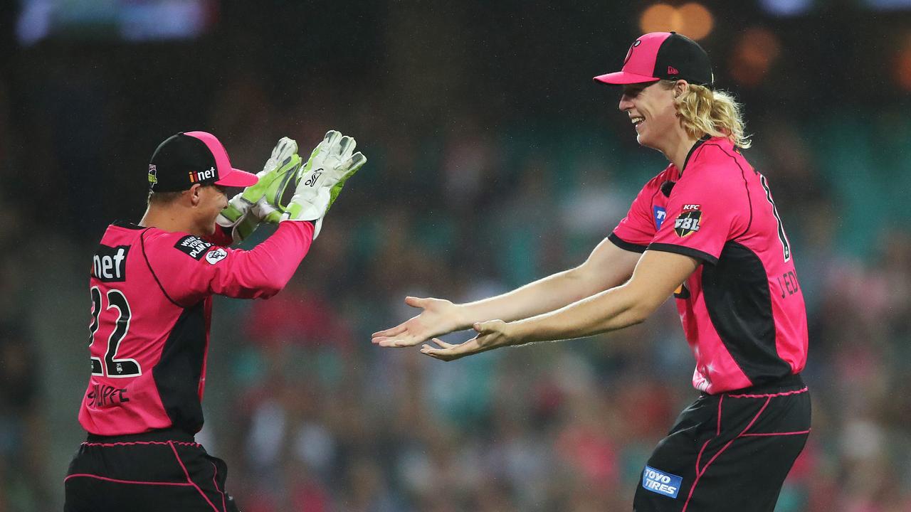 Josh Philippe celebrates a wicket with Jack Edwards during BBL08. Picture. Phil Hillyard