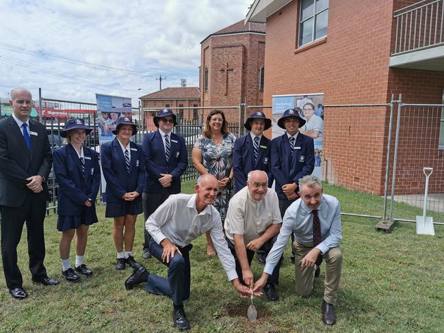 Back row L to R: Aaron Beach (former Principal), Liberty James, Kaitlin Walker, Jackon Whiton, Principal Tracy Robinson, Kalen Olive, Shane Rosolen. Front L to R: Casino Mayor Robert Mustow, Fr Peter Slack, Kevin Hogan MP. (Credit: Adam Daunt)