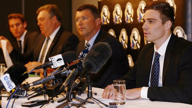 Collingwood duo Lachie Keeffe and Jsh Thomas front the media with CEO Gary Pert and footy manager Neale Balme today . Pic: Michael Klein