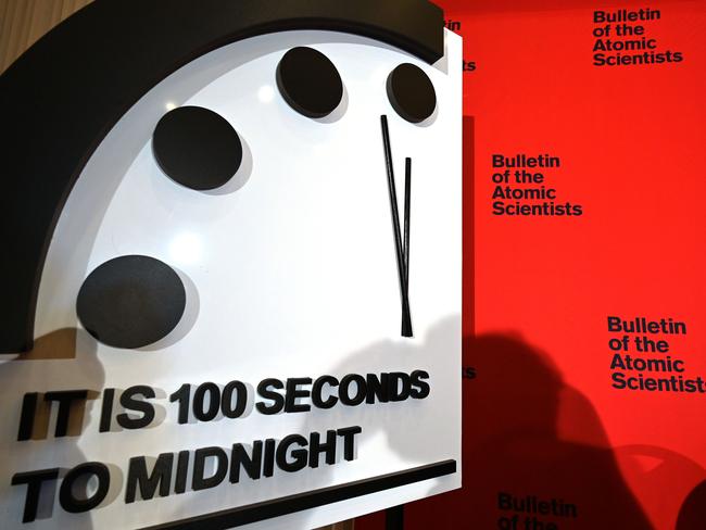 The Doomsday Clock reads 100 seconds to midnight, a decision made by The Bulletin of Atomic Scientists, during an announcement at the National Press Club in Washington, DC on January 23, 2020. - President and CEO of the non-profit group Rachel Bronson said "It is the closest to Doomsday we have ever been in the history of the Doomsday Clock." The clock was created in 1947. (Photo by EVA HAMBACH / AFP)