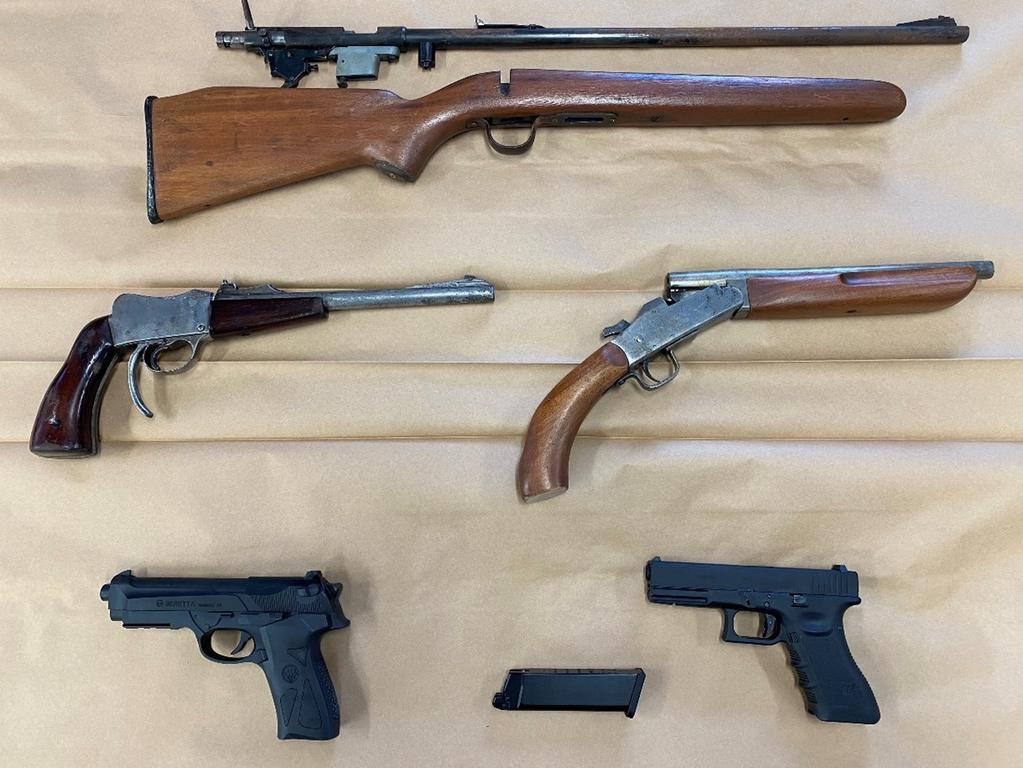 Some of the guns found by Tasmania Police after a raid on a property in Burnie. They have charged a 51-year-old former bikie with firearms offences. Picture: Tas Police