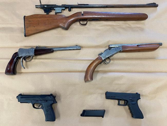 Some of the guns found by Tasmania Police after a raid on a property in Burnie. They have charged a 51-year-old former bikie with firearms offences. Picture: Tas Police