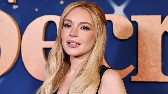 NEW YORK, NEW YORK - NOVEMBER 18: Lindsay Lohan attends the screening of Netflix's 