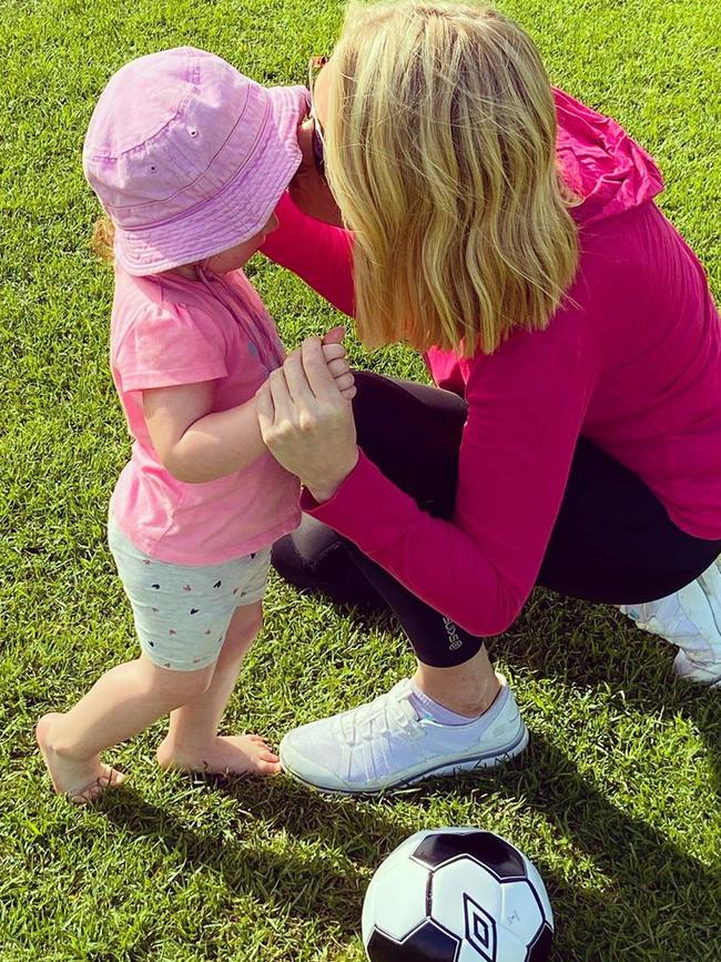 Erin Molan at the park with Eliza.