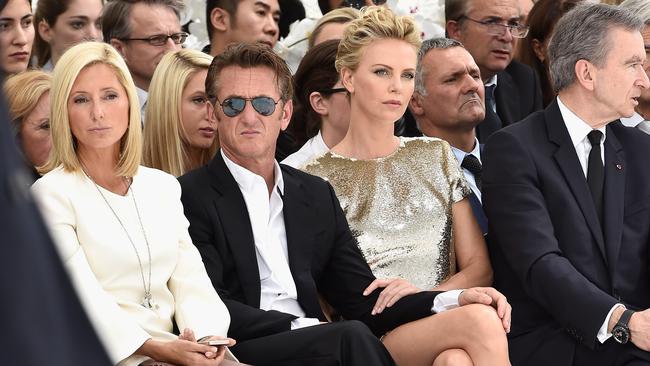 Powerhouse ... (from left) Marie-Chantal of Greece, Sean Penn, Charlize Theron and Bernard Arnault attend the Christian Dior show as part of Paris Fashion Week — Haute Couture Fall/Winter 2014-2015 in Paris, France.