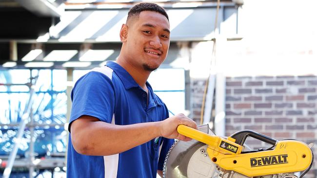 WEEKEND TELEGRAPHS SPECIAL. APRIL 11, 2024. PLEASE CONTACT WEEKEND PIC EDITOR JEFF DARMANIN BEFORE PUBLISHING.,, Pictured is Filo Totoa, who is a Parramatta Eels Juniors Player who is determined to stay in school despite his NRL aspirations. He is undertaking the trade training college and works onsite as a tradesman while getting his apprenticeship and HSC. Picture: Tim Hunter.