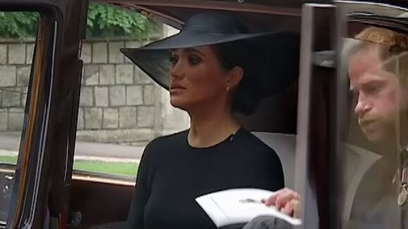 Meghan Markle and Prince Harry leave St. George's Chapel at Windsor castle after the Committal Service for Queen Elizabeth II.