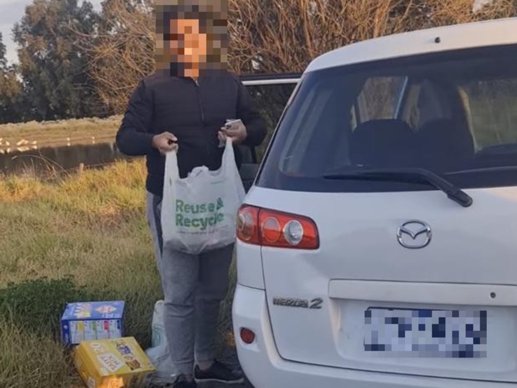 A Woolies delivery driver was spotted dumping an order on the side of a dirt road by an angry onlooker. Picture: Facebook