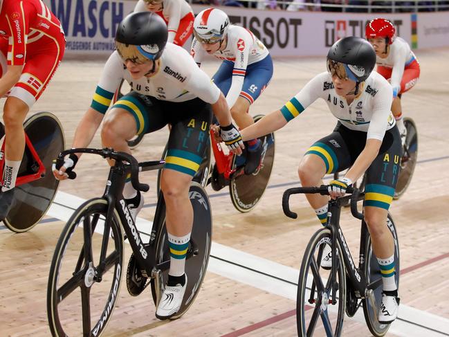 Australia's Amy Cure and Australia's Annette Edmondson hand over during the women's 30km Madison final at the UCI track cycling World Championship at the velodrome in Berlin on February 29, 2020. (Photo by Odd ANDERSEN / AFP)