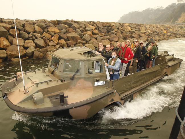 Mallacoota Fires evacuation. The first of the passengers are loaded onto the landing boats by ADF personal.      Picture: David Caird