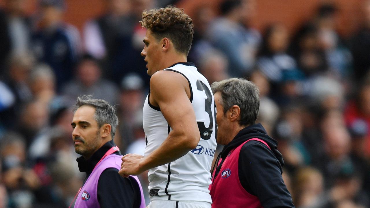 Charlie Curnow leaves the ground during the first quarter (AAP Image/David Mariuz) 