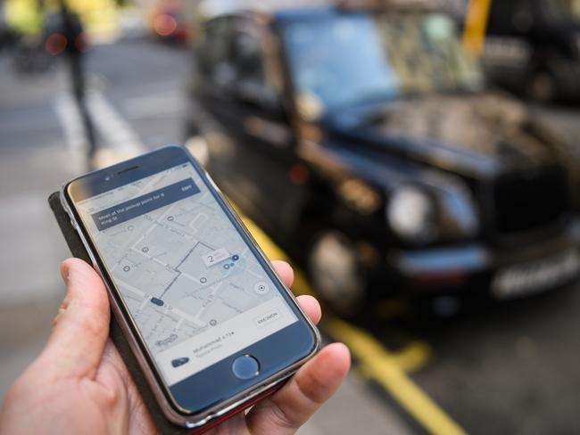 LONDON, ENGLAND - SEPTEMBER 22:  In this Photo Illustration, a phone displays the Uber ride-hailing app on September 22, 2017 in London, England. The Transport Regulator has announced that it will not re-new the company's licence to operate in London as it's current service is "not fit and proper".  (Photo by Leon Neal/Getty Images)