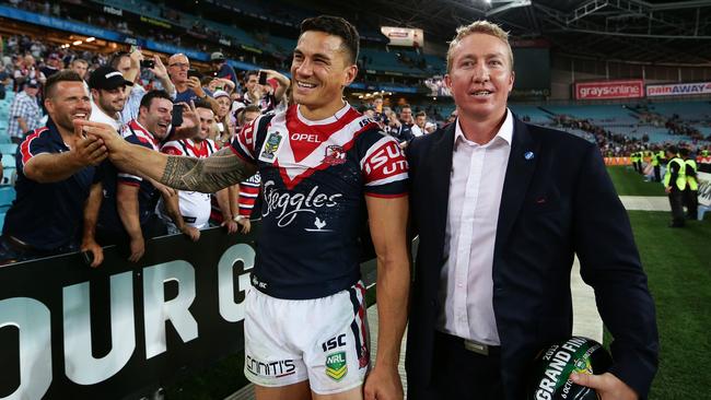 Sonny Bill Williams with coach Trent Robinson after the Roosters won the 2013 NRL grand final. Picture: Brett Costello