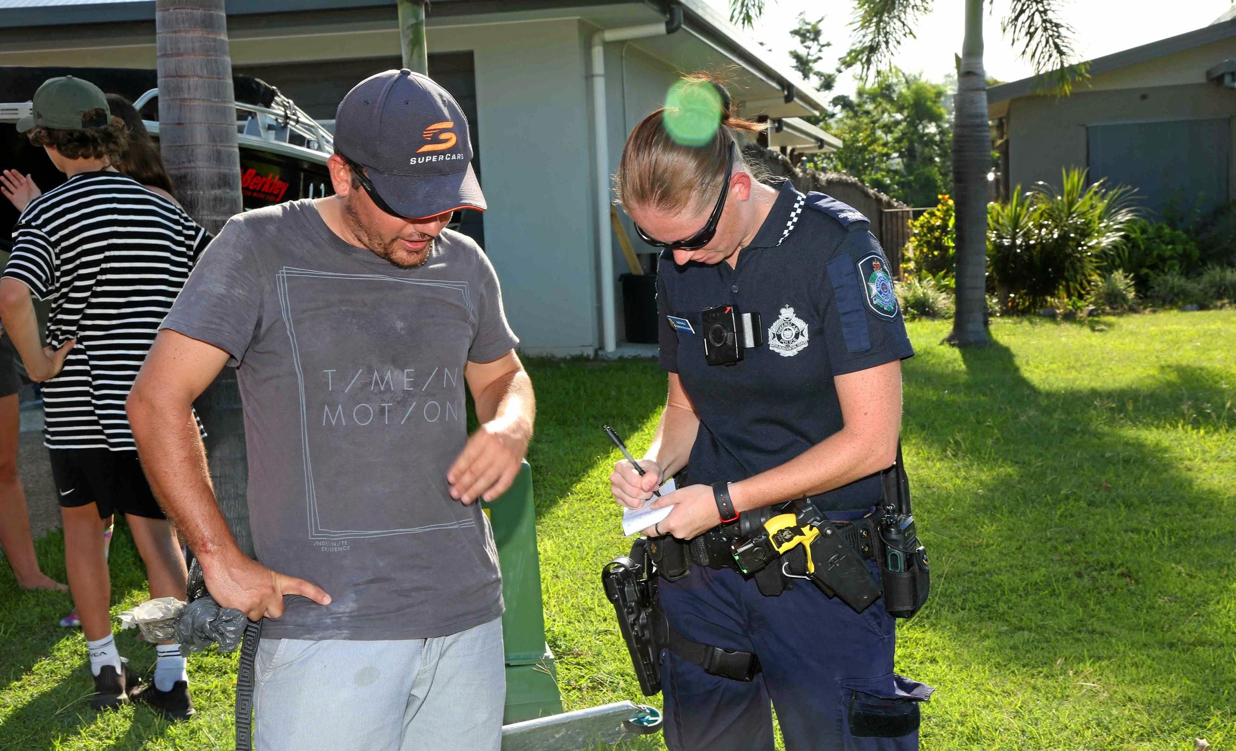Whitsunday Police take statements at the scene of a house fire in Cannonvale. Picture: PETER CARRUTHERS